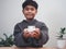 A boy holding piggy bank. Learning financial responsibility and projecting savings. savings concept. investment concept