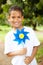 Boy holding pinwheel