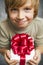 Boy holding present box