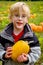 Boy Holding Pumpkin