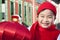 Boy holding red lantern in Courtyard