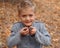 Boy holding salamanders