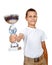 Boy holding sport trophy