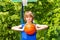 Boy holds ball alone during basketball game