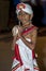 A boy holds a cowrie shell whilst participating in the Esala Perahera in Kandy in Sri Lanka.