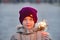 The boy holds a sparkler in his hand. Feast of Christmas and New Year