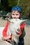 Boy hugging a goat