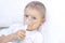 Boy with an inhaler mask - respiratory problems in asthma