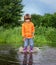 Boy jump in puddle