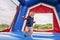 Boy jumping in Bounce house