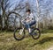 Boy jumping with his dirt bike