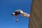 Boy Jumping Somersault Parkour Sky