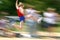 Boy jumping at track meet /motion blur