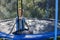 Boy jumping on trampoline. child plays