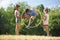 Boy jumps through hula hoop