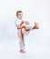 Boy in karategi beats kicking