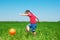 Boy kicking ball