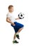 Boy kicking soccer ball by knee isolated