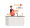 Boy kid in apron washing dishes in kitchen. Small child help do housework at home