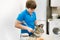 Boy kid baking muffins. Child schooler preparing muffins in the kitchen
