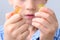 Boy, kid holding sweets in his hands, gummy bear, concept of children`s delicacy, healthy and unhealthy food, halal food