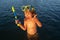 Boy kid swimming on the beach on summer vacation. Child in sea. Happy children swimming and snorkeling in tropical ocean