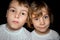 Boy and little girl in white T-shirts isolated