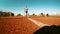 Boy little runner running on outdoor stadium race track. Teenager sprinting during athletics training. Teenage kid