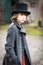 Boy in Long Coat and Top Hat