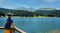 Boy looking lake of Payolle in the french Pyrenees