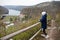 Boy looking at panorama Znojmo dam in Czech Republic