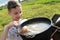 Boy looking at russian fish soup