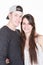 boy lover student couple man with cap and beautiful woman long haired girl