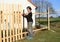 Boy making fence