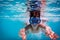 Boy in mask dive in swimming pool