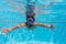 Boy in mask dive in swimming pool