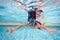 Boy in mask dive in swimming pool