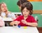 Boy Molding Clay At Classroom