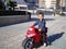 A boy on a moto