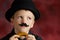 Boy with moustache and bowler