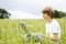 Boy with notebook on the field