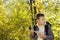 Boy orienteering in forest