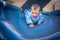 Boy on an outdoor slide