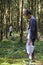 Boy picking wild mushrooms