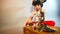 Boy pirate plays with dolls and a set of pirates.
