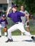 Boy pitching baseball