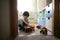 Boy playing alone in the room, loneliness