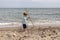 Boy playing at the beach