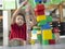 Boy Playing With Building Blocks In Class