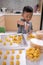 boy playing with nastar cake